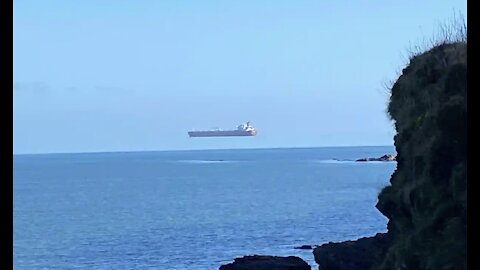 Ship appears to float through sky in photo taken off England's Cornish coast