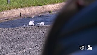 Water still gushing into road after three weeks of complaints
