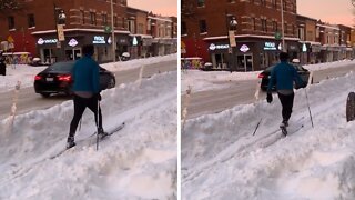Critical thinker uses skis to get around downtown Toronto