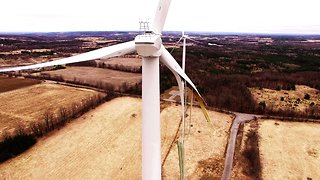 Aftermath of giant wind turbine explosion filmed by drone close up