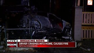 Driver crashes into home, causes house fire