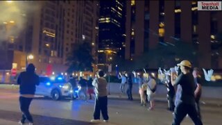 Mob Attacks Chicago Police With Fireworks