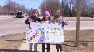 Girl Scouts host a drive-up cookie booth