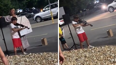 Kid street performer blows crowd away with violin performance
