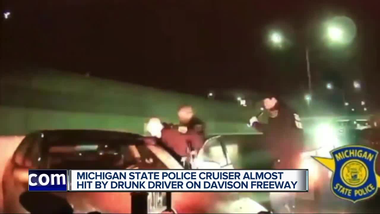Michigan State Police cruiser almost hit by drunk driver on Davison Freeway