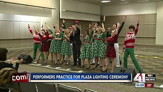 Performers practice for Plaza lighting ceremony