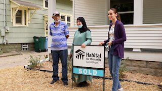 Lansing refugee family, volunteers dedicate new Habitat for Humanity home