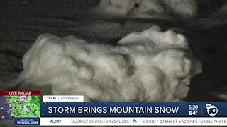 Winter storm coats mountain areas with snow