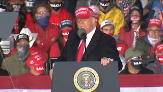 President Trump speaks to supporters at a rally in Janesville
