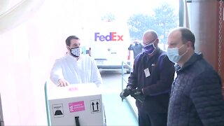 Gov. Jared Polis receives Colorado's first shipment of COVID-19 vaccine