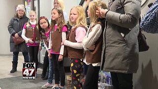 Orthodontics office and Girl Scouts team up to give cookies to first responders