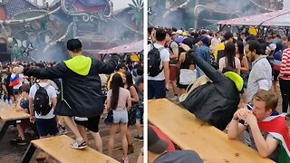 Unlucky Festival Goer Falls Off Table While Raving