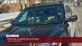Stolen car chase: Man exchanges gunfire with officers, crashes into pole