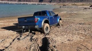Water levels dropping, people stuck in the mud at Lake Mead