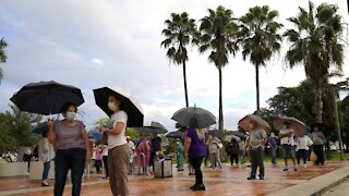 Floridians Face Long Lines, Rain On Day 1 Of Early In-Person Voting