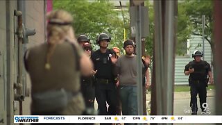 CPD arrest about 100 people Monday night