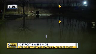 Residents trapped by flooded street on Detroit's west side