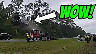 CAR LAUNCHES OFF TOW TRUCK!