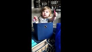 Baby Emmey playing in toy box!!