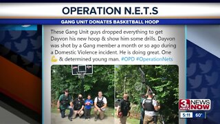 Gang unit donates basketball hoop