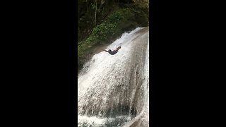 Daredevil dives off waterfall in epic slow motion