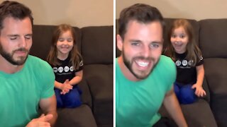 Dad & daughter close their eyes and clap at exact same time