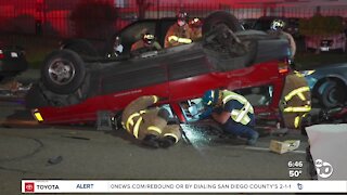 Driver trapped in wreckage after rollover crash in Clairemont