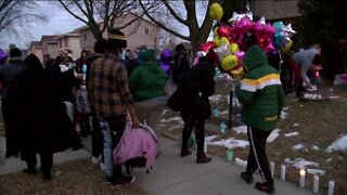Family gathers at vigil for 8-year-old Milwaukee girl fatally shot
