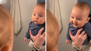 Adorable footage shows toddler's first encounter with a mirror