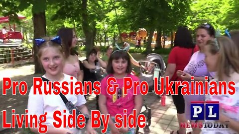 Pro Russia & Pro Ukraine People Living together In The Warzone