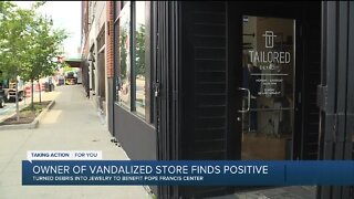 Detroit business owner uses broken glass, concrete left by vandal to help others