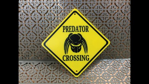 Predator Crossing Sign