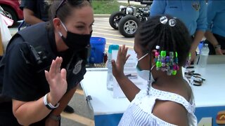 MPD Officers connect with community members over brats