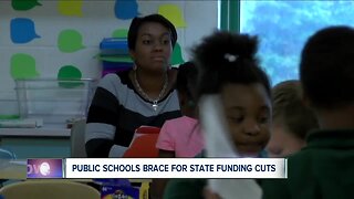 Public schools brace for additional funding cuts