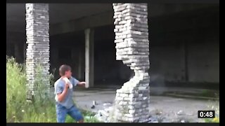 Guy collapses building