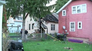 Fire crews rescue child from roof of house fire