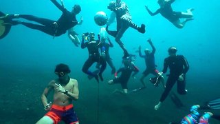 Boogie water-land! Incredible video shows underwater disco
