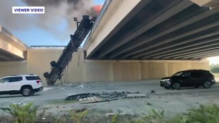 VIEWER VIDEO: Truck goes off overpass, bursts into flames