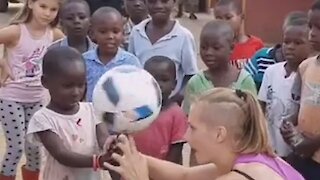 Freestyle Player Brings Joy To Kids By Involving Them In Ball Spinning Trick