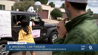Local couple surprised by family with wedding parade