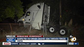 Driver arrested after semi-truck crashes through fences in Vista