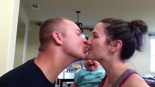 Parent Smooches Makes This Baby Crack Up Laughing