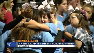 Cheer squad honors murdered friend at football game