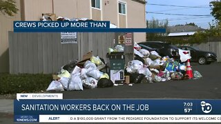 Sanitation workers back on the job