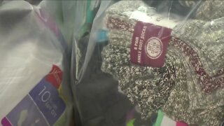 Group giving socks to Marshall Fire victims