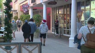 Shoppers searching for Black Friday deals at Miromar Outlets