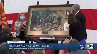 Officials unveil painting dedicated to Kayla Mueller