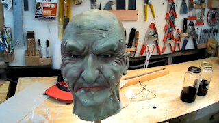 Filling a Halloween Mask with Foam