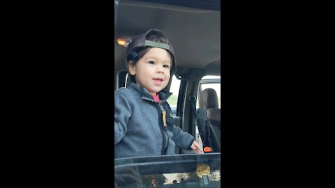 Dancing boy in his dream truck