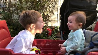 Baby boy thinks big brother is hilarious